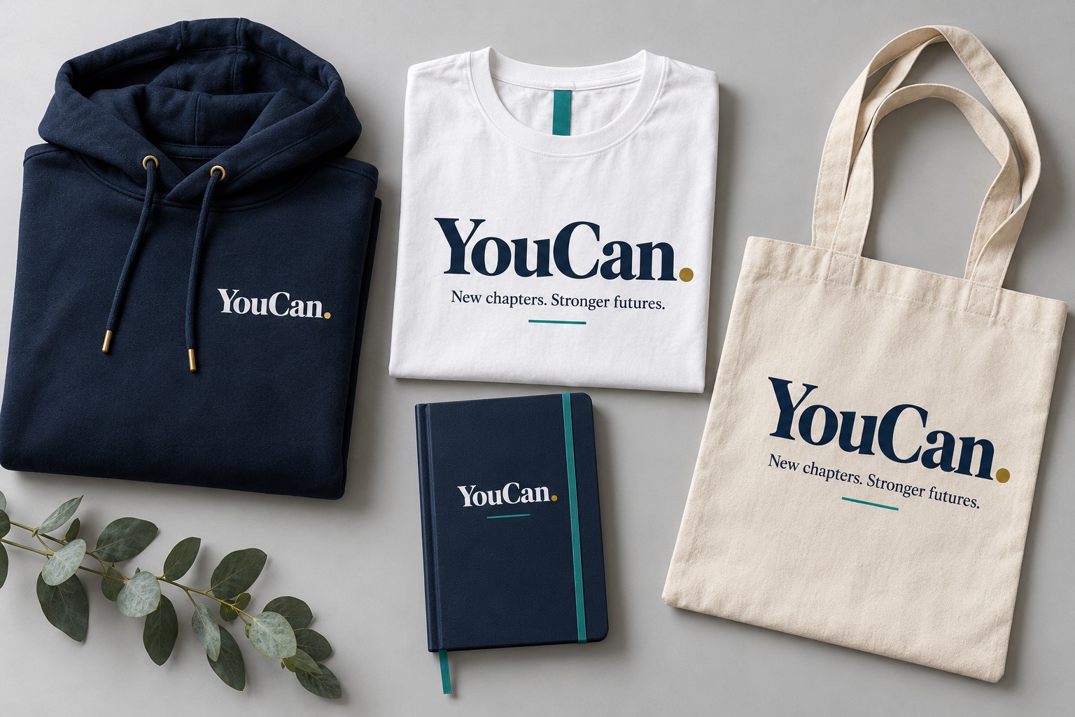 Concept designs for a YouCan hoodie, T-shirt, tote bag and notebook